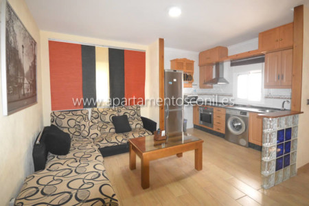 Apartamento Conil con sofá